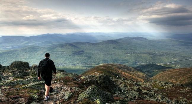 Hiker on Airline trail near Mt. Adams in the White Mountains of New Hampshire.