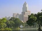 View across the lake in Lumpini Park in Bangkok, Thailand;