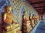BANGKOK, THAILAND - AUGUST 11: golden Buddha statues in Wat Arun temple, Bangkok - Thailand on August 11,2012. Buddhism is Thailand official religion and is the religion of more than 90% of its people; Shutterstock ID 131225321; Project/Title: Bangkok App;