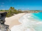 Bottom Bay is one of the most beautiful beaches on the Caribbean island of Barbados. It is a tropical paradise with palms hanging over turquoise sea and a pirate cave