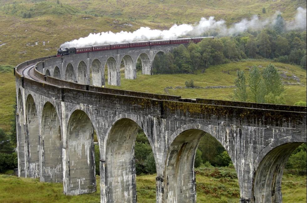Steam train on Glenfinnan viaduct. Scotland. United Kingdom. ; Shutterstock ID 99218126; Project/Title: Fodor's Scotland color insert; Destination: Scotland; Downloader: Melanie Marin, top 200