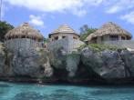 TURQUOISE OCEAN. Building houses on Negril Coast.; 
