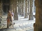 DELHI, INDIA - NOV21:Unidentified Indian women go through the gallery of Quwwat-ul-Islam Mosque on November 21, 2012 in Qutub Minar complex, Delhi, India. There are over four million visitors yearly.