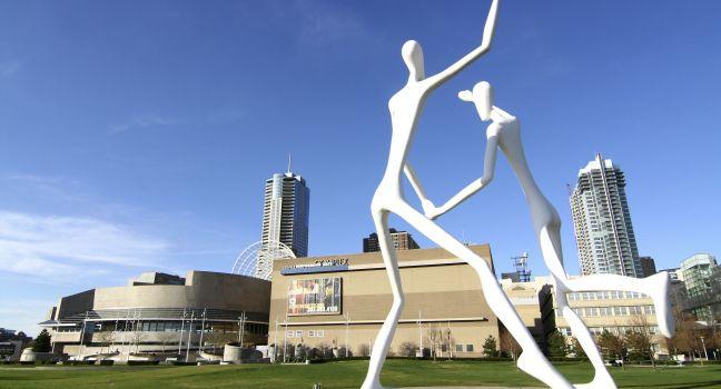 Sculpture Park is home to the landmark sculpture by Jonathan Borofsky: Dancers. The towering figures are a familiar landmark in downtown Denver, Colorado and the park provides a beautiful entrance to the Denver Performing Arts Center.