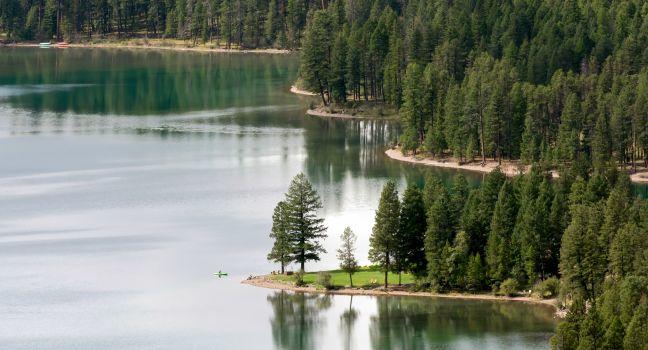 HOLLAND LAKE, MONTANA/USA - SEPTEMBER 19 : Scenic view of Lake Holland in Montana USA on September 19, 2013. Unidentified person.