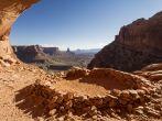 So-called 'False Kiva' class 2 archaeological site in Canyonlands National Park, with a view of Candlestick Tower in the Background. Utah