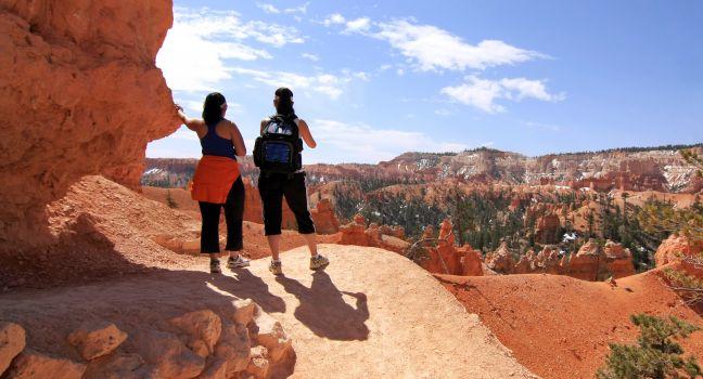 Hikers looking at landscape in Bryce Canyon national park, Utah, USA.