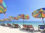 Beach chair and colorful umbrella on the beach , Phuket Thailand 