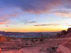 Sweeping sunset panoramic view of famous Delicate Arch in Arches National Park in Moab, Utah (HDR).