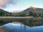 Lockett Meadow in autumn with San Francisco Peaks shrouded in clouds after snow storm.