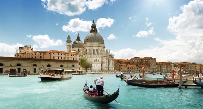 Grand Canal and Basilica Santa Maria della Salute, Venice, Italy and sunny day.