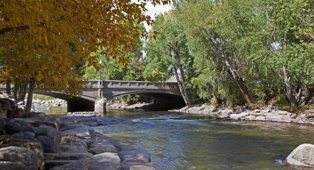 Arkansas River flowing under old bridge in Salida, Colorado; Shutterstock ID 86010220; Project/Title: USA America's 10 Best River Towns; Downloader: Fodors Travel
