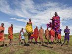MASAI MARA, KENYA - DECEMBER 2: Unidentified Masai warriors dance and participate in traditional jumps as part of a cultural ceremony on December 2, 2011 in Masai Mara National Park, Masai Mara, Kenya