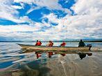 LAKE NAIVASHA, KENYA- OCTOBER 16: Tourists taking a boat trip on October 16, 2012 on Lake Naivasha, Kenya. Lake Naivasha is popular with both foreign and domestic tourists.