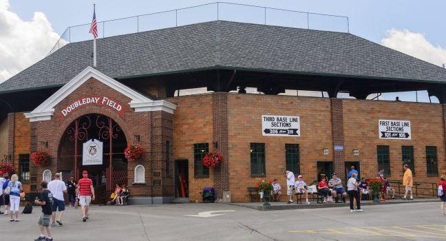 Cooperstown, NY, USA-July 26, 2014: Baseball fans gathered at Cooperstown, NY for the induction of the 75th Hall of Fame ceremony gather on Saturday at the Field of Dreams in Cooperstown.