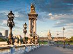 Stunning Pont Alexandre III bridge (1896) spanning the river Seine. Decorated with ornate Art Nouveau lamps and sculptures it is the most extravagant bridge in Paris.