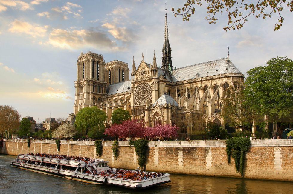 Paris, Notre Dame  with boat on Seine, France.