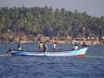 Indian fishermen on the boat, Palolem, Goa state, India.