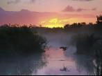 Everglades National Park at Sunrise with the Silhouette of a Flying Heron; Shutterstock ID 104417945; Project/Title: Go While You Can &#xe2;&#x80;&#x93; In-Danger World Heritage Sites; Downloader: Melanie Marin