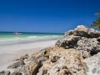 Boulders placed on beach to prevent erosion.