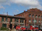 Fire engines in front of fire station,	 	St. Johnsbury	Vermont