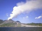 Active volcano in the Soufriere Hills Montserrat Lesser Antilles Leeward Islands West Indies Caribbean with solidified lava fields down to sea 