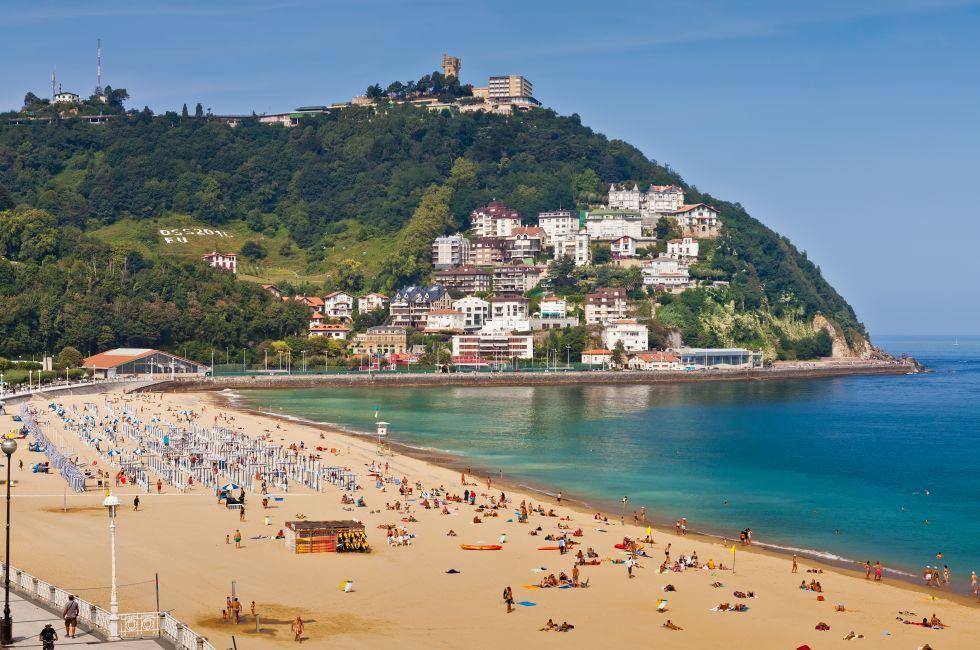 SAN SEBASTIAN, SPAIN - SEP 10: Beach of La Concha on September 10, 2012 in San Sebastian, Spain. With length of 1350 meters and 40 meters wide, it is one of the most famous urban beaches in Spain.