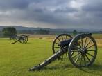 Morning storm clouds over a row of cannon at Antietam Battlefield at Sharpsburg, Maryland, USA.