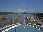 Cruise ship passing through locks in the Panama Canal, a major waterway linking the Atlantic and Pacific oceans.