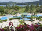 The Gamboa Rainforest Resort grounds with swimming pool and the Rio Chagres in the background.