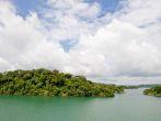 View on a Panama canal's Gatun lake, famous place for birdwatching, with beautiful cloudscape in background. .