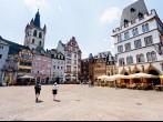TRIER, GERMANY- JUNE 28: old Market square in Trier, Germany, on June 28, 2010. This cental square came into existence around 10th century and marked by a replica of stone cross that dates 958 year.