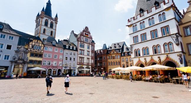 TRIER, GERMANY- JUNE 28: old Market square in Trier, Germany, on June 28, 2010. This cental square came into existence around 10th century and marked by a replica of stone cross that dates 958 year.