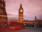 Big Ben and the Houses of Parliament at Westminster, taken at sunset, with busy London traffic trails in the foreground.