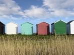 Colorful Beach huts at Calshot on the Solent near Southampton in Hampshire.