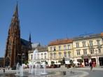 OSIJEK, CROATIA - July 19: Main square with the cathedral at July 19, 2013 in Osijek, Croatia. Osijek is the capital city of Slavonia, with mixed Hungarian - Croatian architecture.
