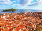 View of many landmarks of Old town in city of Dubrovnik, Croatia. Classic red tiled rooftops with Adriatic sea and island also are beautiful.