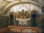 The Capuchin Crypt is a small space comprising several tiny chapels located beneath the church of Santa Maria della Concezione dei Cappuccini on the Via Veneto near Piazza Barberini in Rome, Italy. It contains the skeletal remains of 4,000 bodies believed 