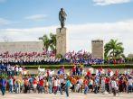 SANTA CLARA, CUBA-MAY 1, 2012:  Cubans march in celebration of the May Day International Worker's Day according to Communist Countries. This event is government sponsored and it happens every year; Shutterstock ID 199849301; Project/Title: Fodor's Cuba; Do
