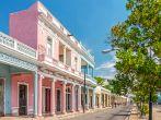 Traditional colonial style colored buildings located on main street Paseo el Prado in Cienfuegos, Cuba