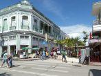 A lively downtown street in the city of Cienfuegos, Cuba.