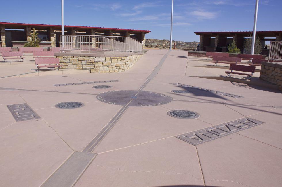 Four corners landmark indicating the four states lines connecting Colorado, New Mexico, Utah and Arizona.