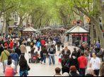 People walk by at the famous La Rambla in Barcelona, Spain.