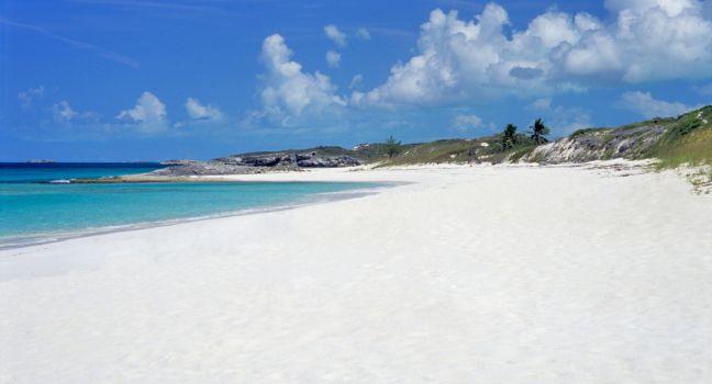 A deserted white sandy beach on the Romantic Great Exuma Island, The Bahamas.