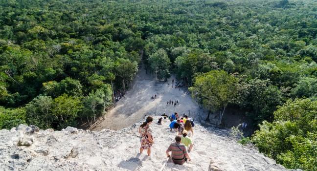 Descending Coba pyramid; 
