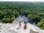 Descending Coba pyramid; 