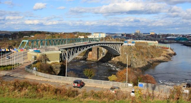 View of downtown Saint John, New Brunswick, Canada with the Reversing Falls and bridge in the foreground 