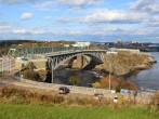 View of downtown Saint John, New Brunswick, Canada with the Reversing Falls and bridge in the foreground 
