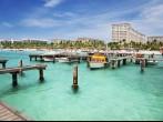 Dock on Palm Beach, Aruba on a sunny Spring afternoon.