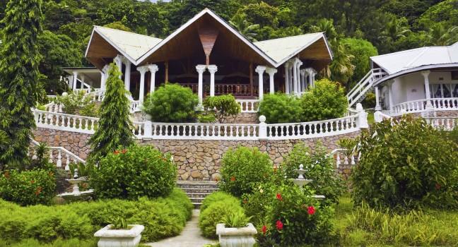 Hotel at tropical island, Seychelles - vacation background; 